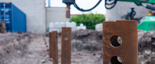 Screw piles installed in a line